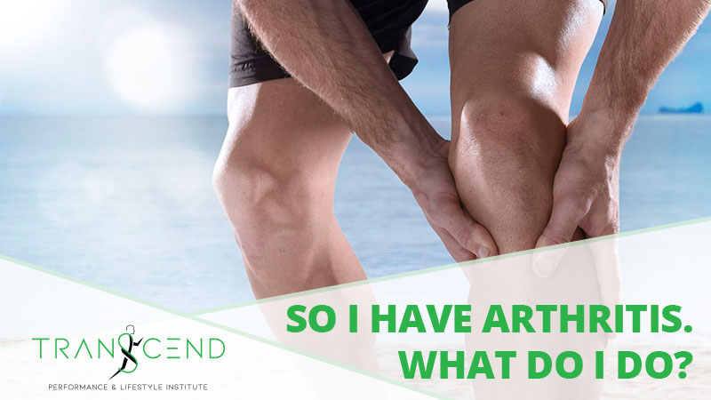 A person with arthritis bending down and holding their knee.